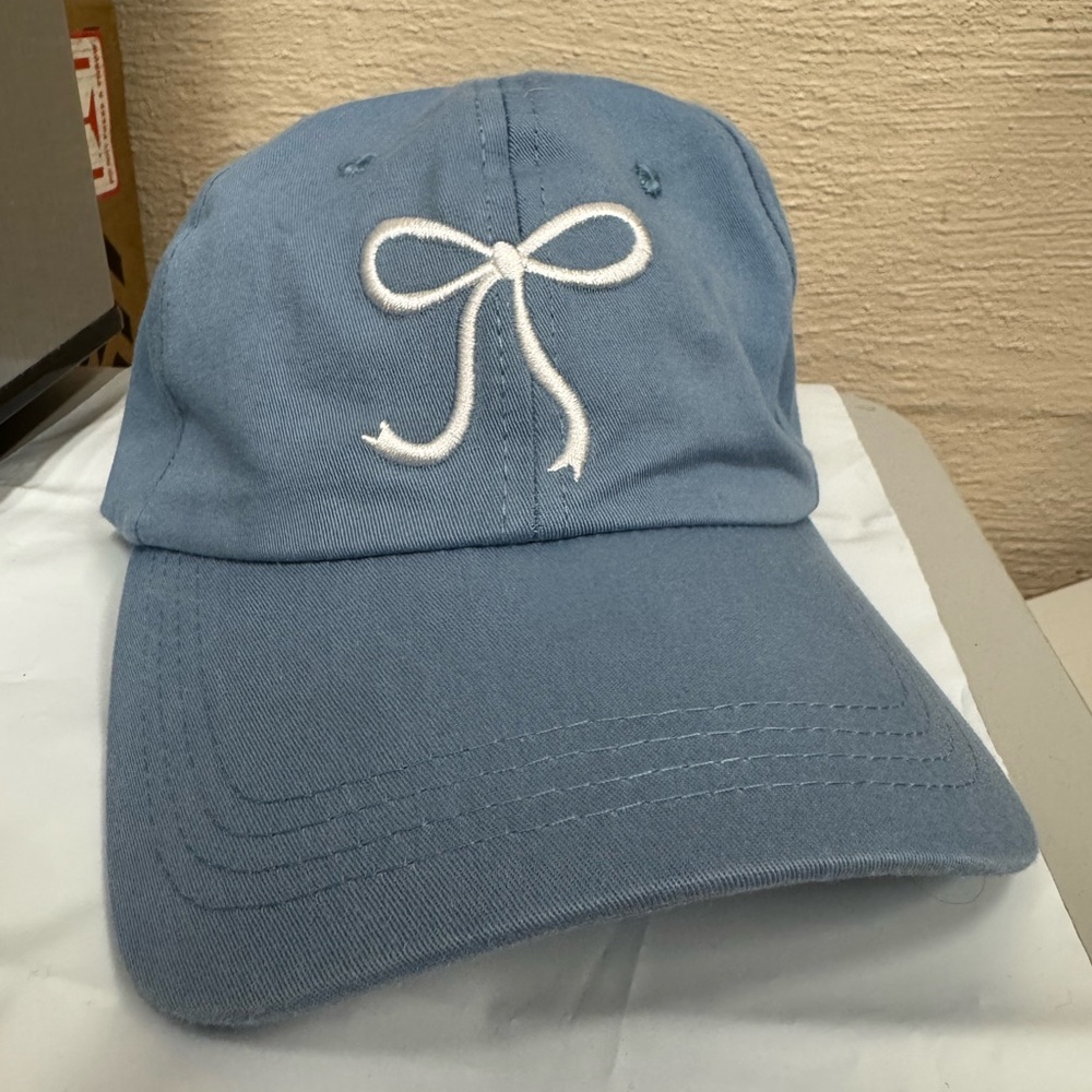 Blue Cap with White Bow Embroidery
